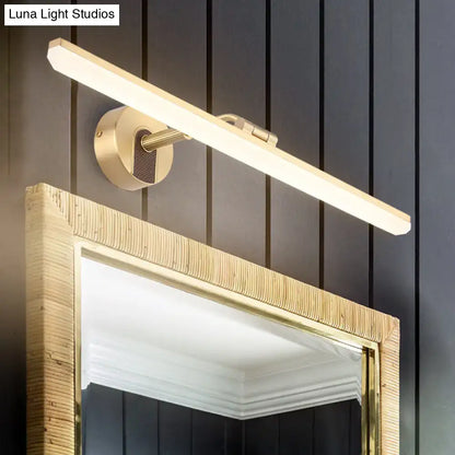 Decorbites black brass swing-arm vanity light wall-mounted above wood mirror with frosted bar on Tampa Home & Garden Store