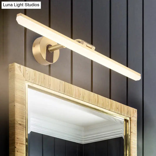 Decorbites black brass swing-arm vanity light wall-mounted above wood mirror with frosted bar on Tampa Home & Garden Store
