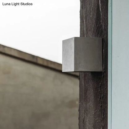 Grey cement square wall lamp by Decorbites mounted on a dark timber post on Tampa Home & Garden Store