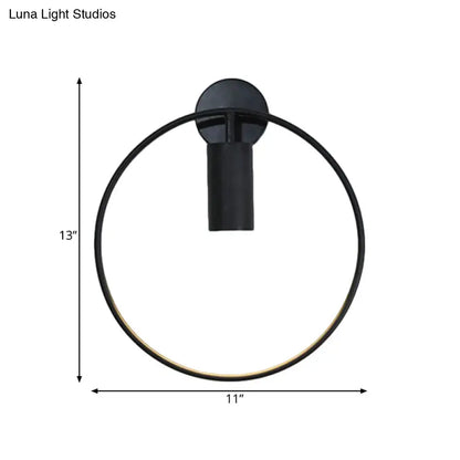 Black circular metal sconce with 11-in ring diameter and 13-in overall height by Decorbites on Tampa Home & Garden Store