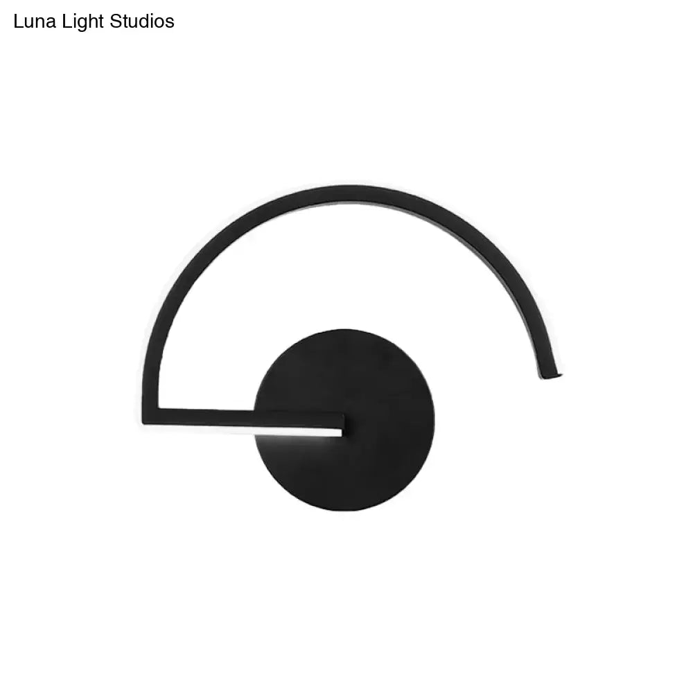 Black Curved Open-Frame Wall Sconce with round backplate in black metal on Tampa Home & Garden Store