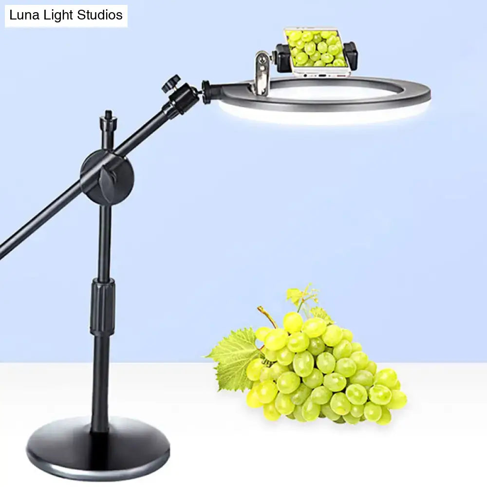 Black ring vanity light with adjustable arm and LED panel by Decorbites on Tampa Home & Garden Store