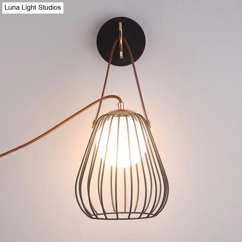 Black Pear Cage Matte Wall Sconce by Decorbites with a metal cage and warm glow on Tampa Home & Garden Store