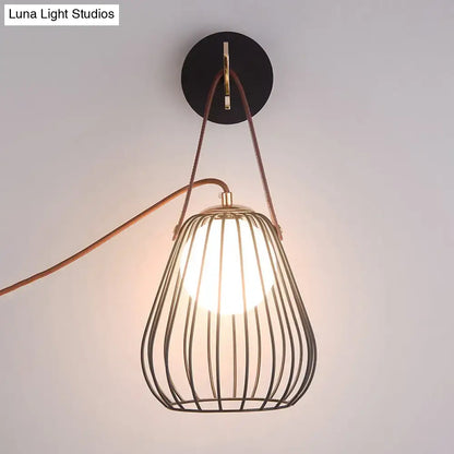 Black Pear Cage Matte Wall Sconce by Decorbites with a metal cage and warm glow on Tampa Home & Garden Store