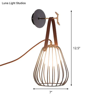 Black pear cage matte wall sconce with copper hardware by Decorbites on Tampa Home & Garden Store