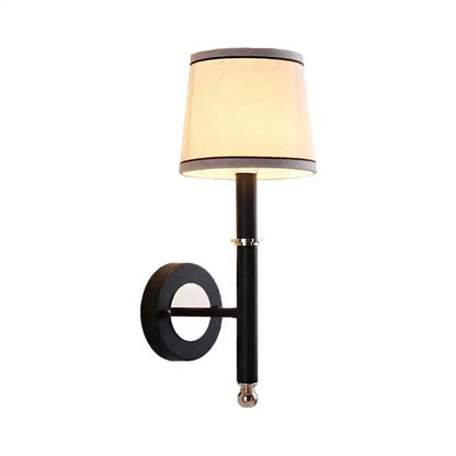 Decorbites Black Flaxen Cone Wall Sconce with beige shade and circular wall mount on Tampa Home & Garden Store