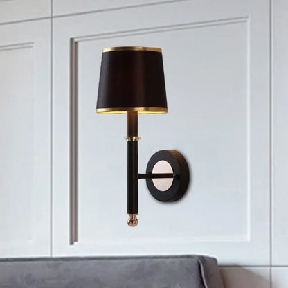 Black Flaxen Cone Wall Sconce with black shade and gold trim wall mounted on Tampa Home & Garden Store