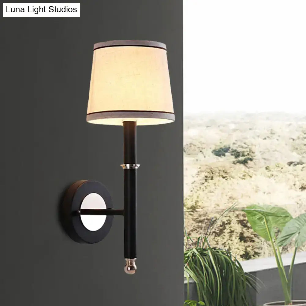 Black flaxen cone wall sconce by Decorbites with black stem and beige fabric shade, 1 piece on Tampa Home & Garden Store
