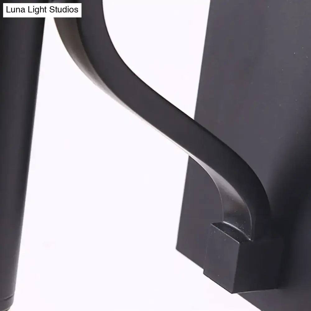 Black Flaxen Cone Wall Sconce with curved metal arm and square wall mount on Tampa Home & Garden Store