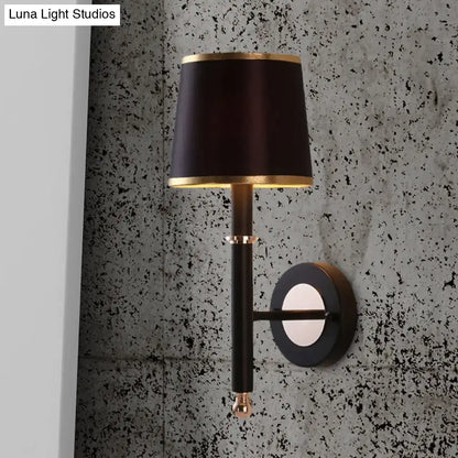 Black Flaxen Cone Wall Sconce by Decorbites with black shade and gold trim wall-mounted on Tampa Home & Garden Store