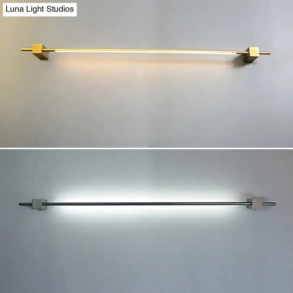Minimalist Black and Gold Feather Wing Wall Lamp