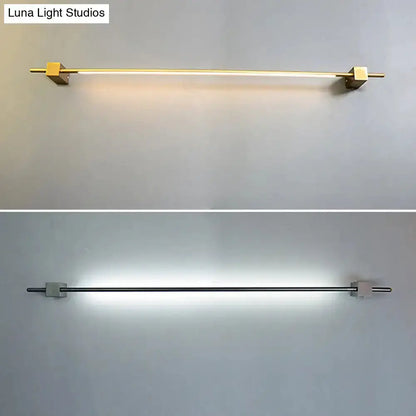 Minimalist Black and Gold Feather Wing Wall Lamp