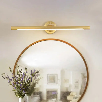 Black Gold Adjustable Sconce by Decorbites brass wall light above a round mirror on Tampa Home & Garden Store