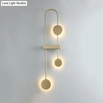 Black Gold Arched Sconce wall light with brass finish and three round discs on Tampa Home & Garden Store