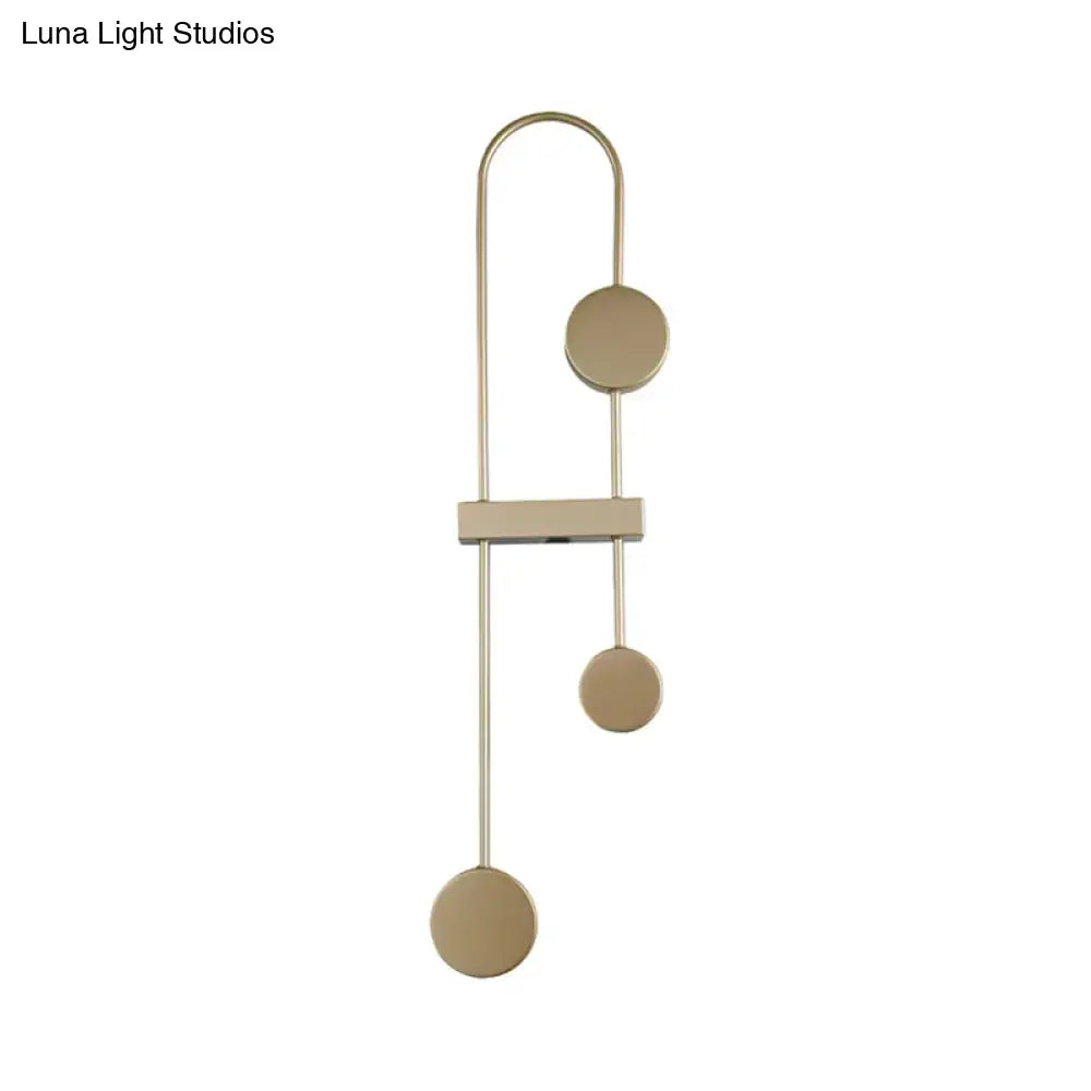 Black Gold Arched Sconce by Decorbites, gold metal wall light with arched frame and round discs on Tampa Home & Garden Store
