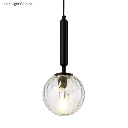 Black Gold Glass Globe Wall Sconce with clear ribbed globe and black hardware on Tampa Home & Garden Store