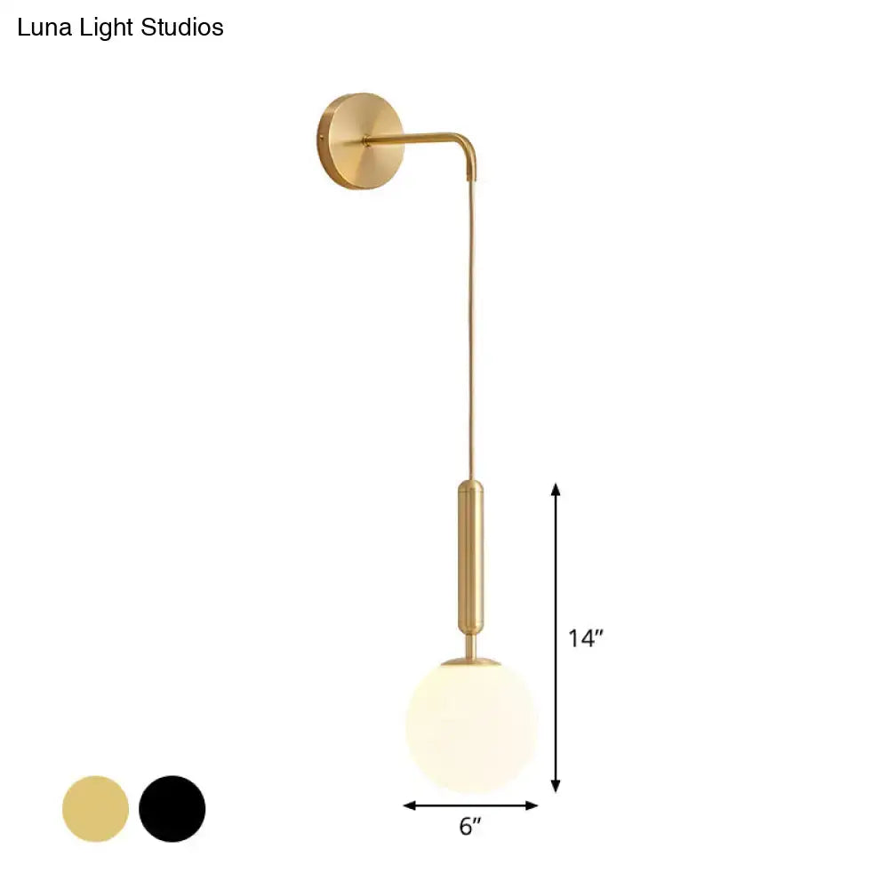 Black Gold Glass Globe Wall Sconce by Decorbites, brass finish with frosted globe shade on Tampa Home & Garden Store