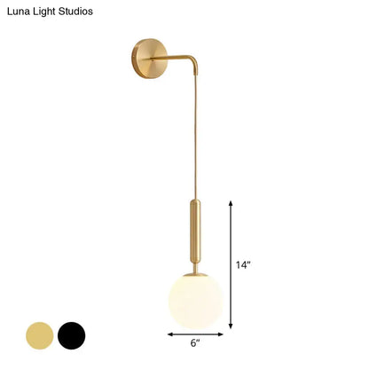 Black Gold Glass Globe Wall Sconce by Decorbites, brass finish with frosted globe shade on Tampa Home & Garden Store
