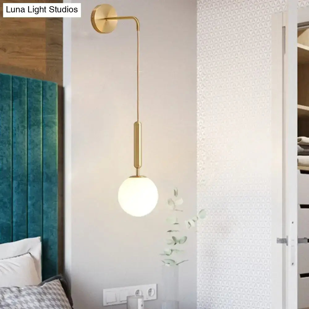 Black Gold Glass Globe Wall Sconce by Decorbites with brass finish and white globe 1-light on Tampa Home & Garden Store