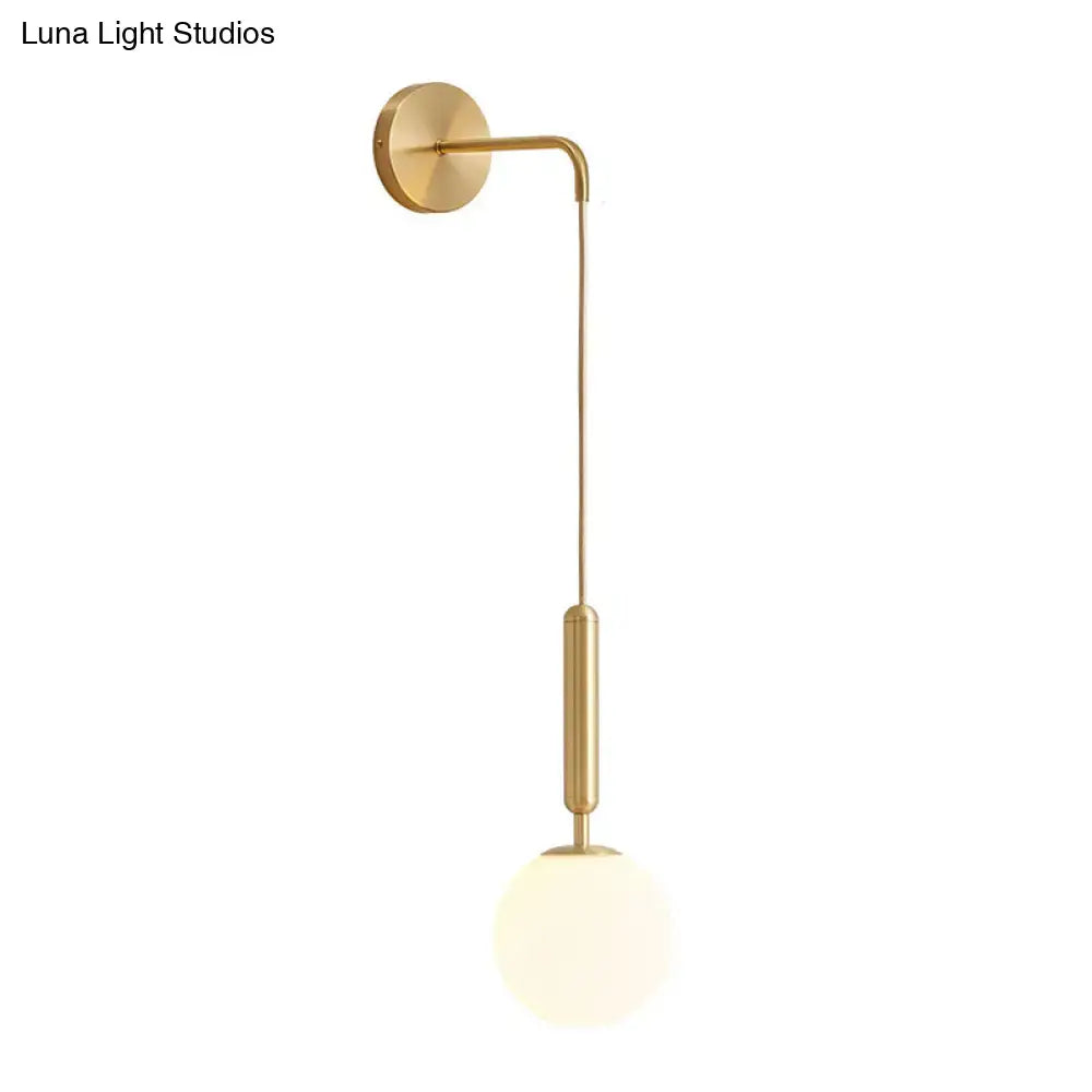 Black Gold Glass Globe Wall Sconce by Decorbites with brass finish and frosted glass globe on Tampa Home & Garden Store