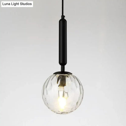 Black Glass Globe Wall Sconce with ribbed glass globe and black metal stem on Tampa Home & Garden Store