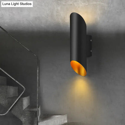 Black Gold Oblique Wall Light with black metal housing and gold interior, wall mounted on Tampa Home & Garden Store
