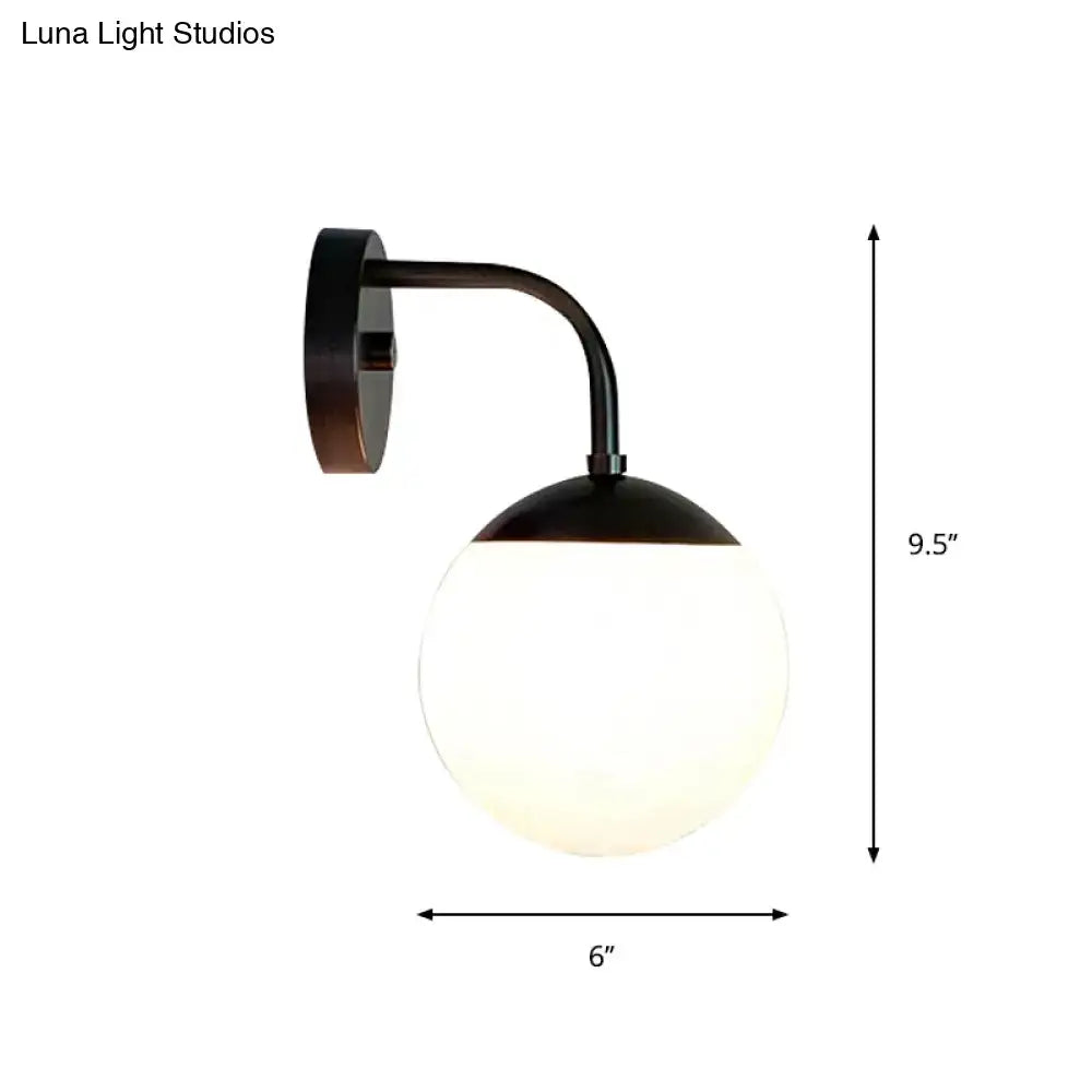 Milky Glass Ball Wall Lamp by Decorbites, frosted globe on black metal wall mount on Tampa Home & Garden Store