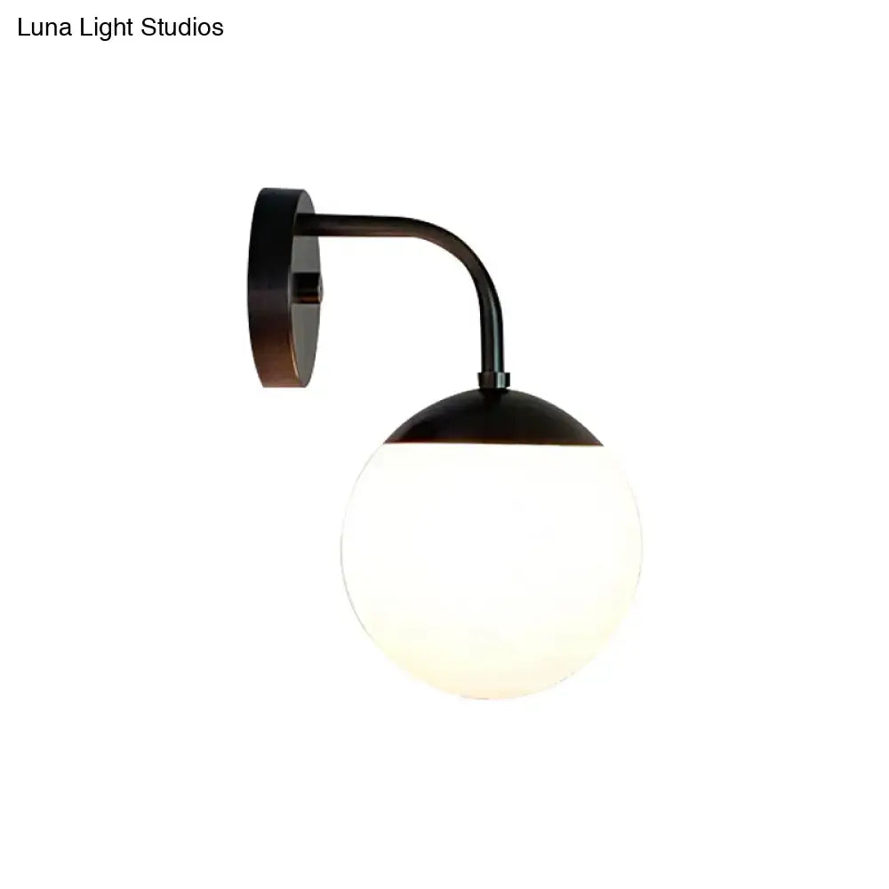 Milky glass ball wall lamp with curved black arm and wall mount Decorbites on Tampa Home & Garden Store