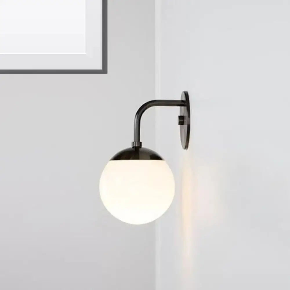 Milky Glass Ball Wall Lamp by Decorbites, black metal wall sconce with frosted glass globe on Tampa Home & Garden Store