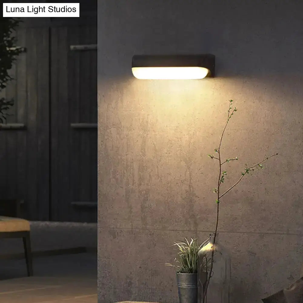 Minimalist Black LED Wall Sconce Capsule