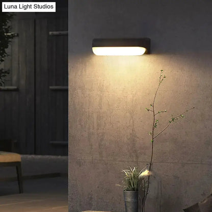 Minimalist Black LED Wall Sconce Capsule