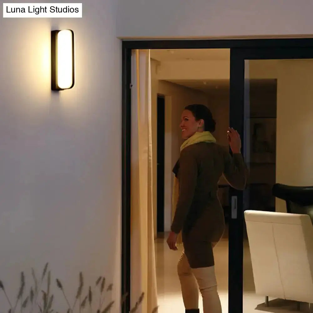 Minimalist Black LED Wall Sconce Capsule