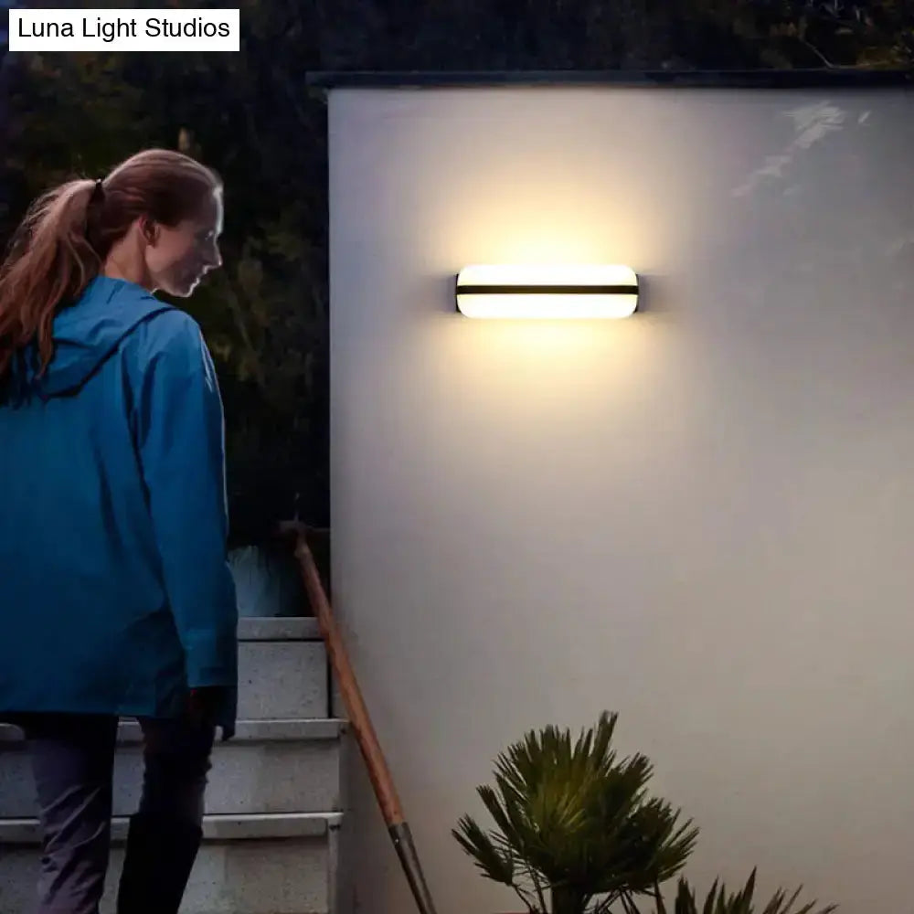 Minimalist Black LED Wall Sconce Capsule