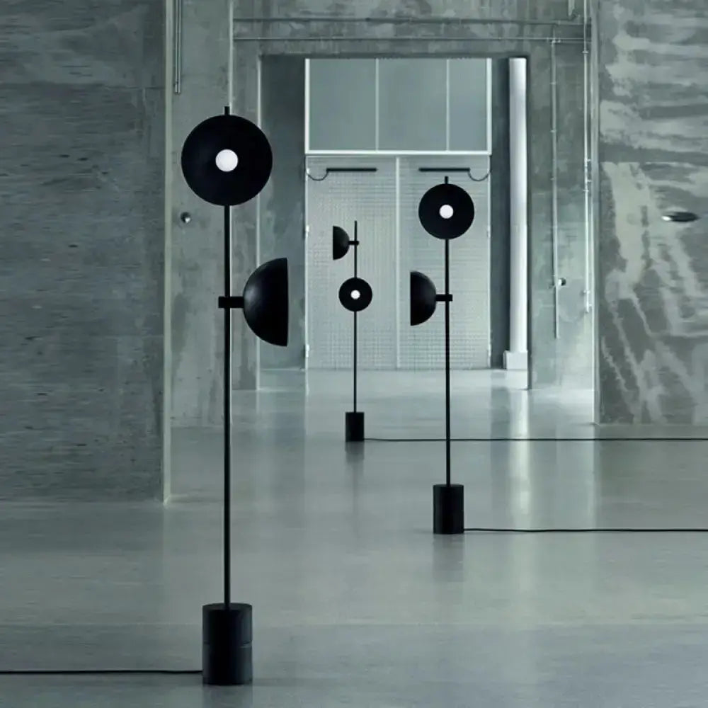 Three minimalist black marble floor lamps with funnel shade by Decorbites for living room on Tampa Home & Garden Store