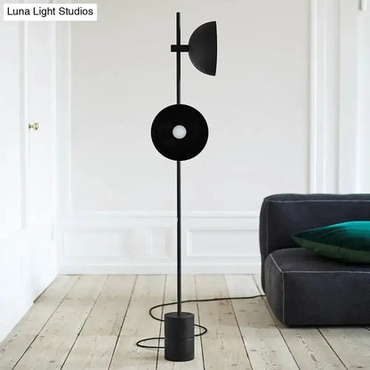 Minimalist black marble floor lamp with funnel shade on Tampa Home & Garden Store