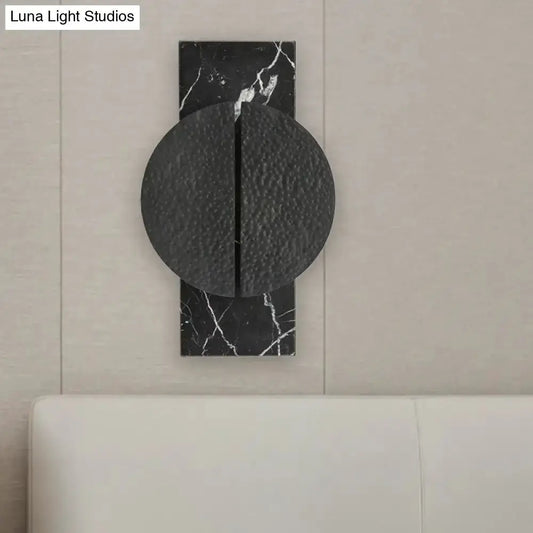 Minimalist black marble wall lamp with circular overlapping discs on marble backplate Decorbites on Tampa Home & Garden Store