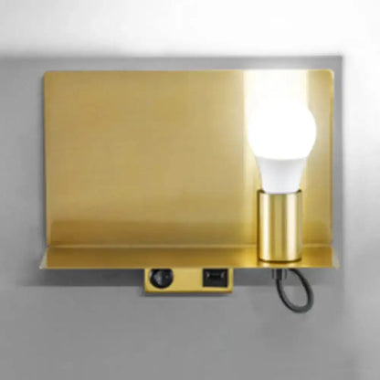 Minimalist wall light fixture by Decorbites with brass gold finish and exposed bulb on Tampa Home & Garden Store