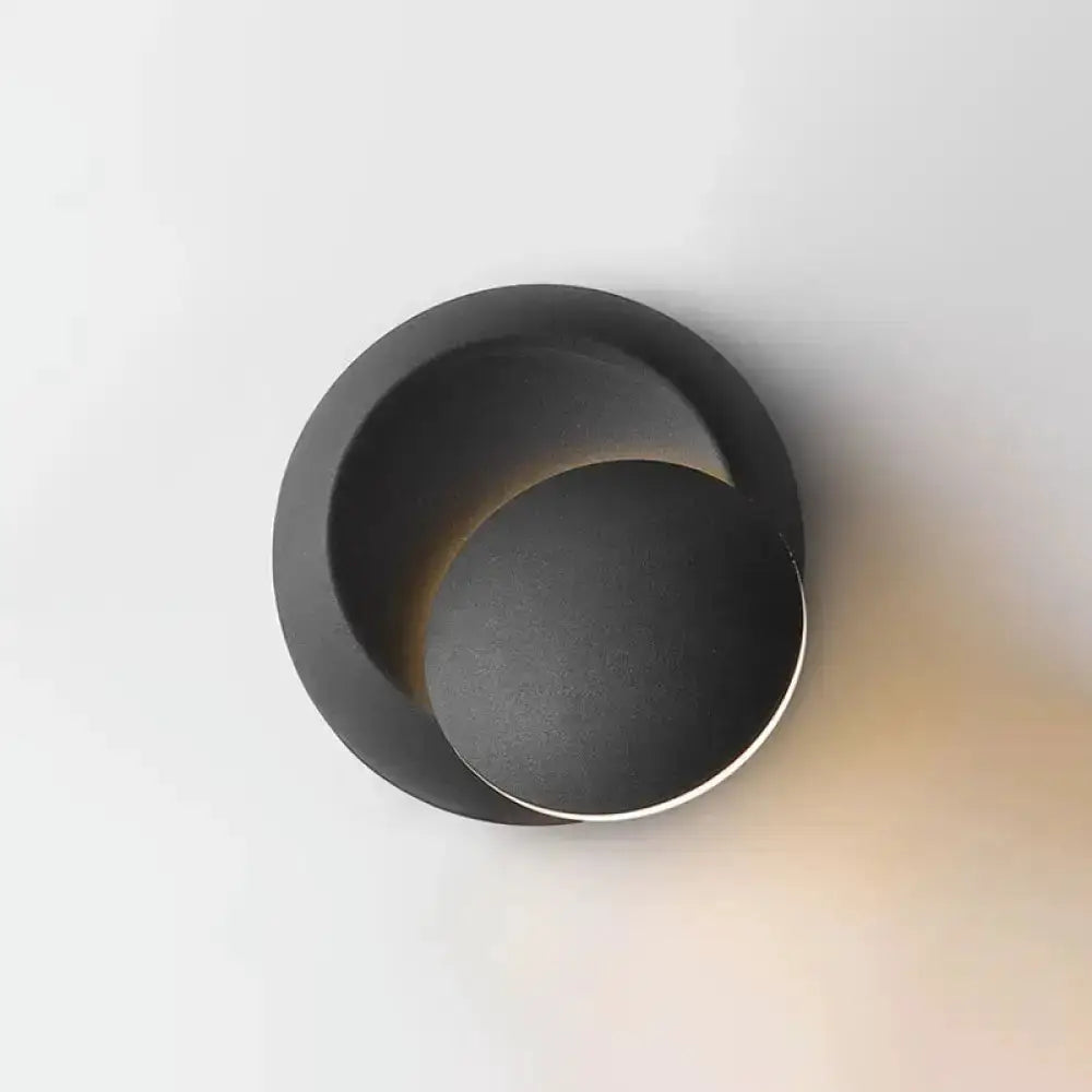 Moon-shaped black wall sconce with overlapping disks, matte finish Decorbites on Tampa Home & Garden Store