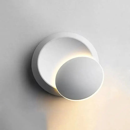 Moon-shaped white wall sconce by Decorbites with overlapping disks and warm glow for bedroom on Tampa Home & Garden Store
