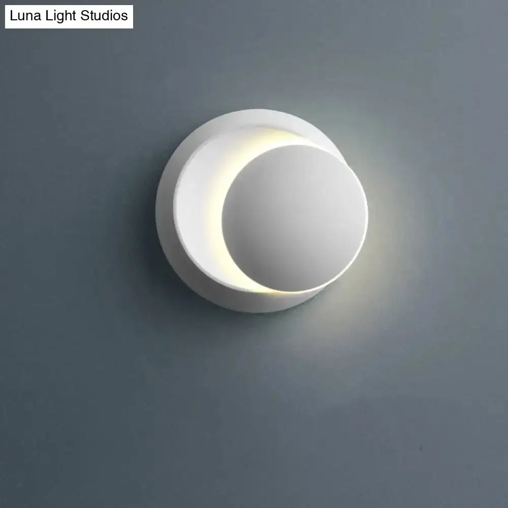 Moon-shaped wall sconce by Decorbites; minimal white finish with soft glow for bedroom lighting on Tampa Home & Garden Store
