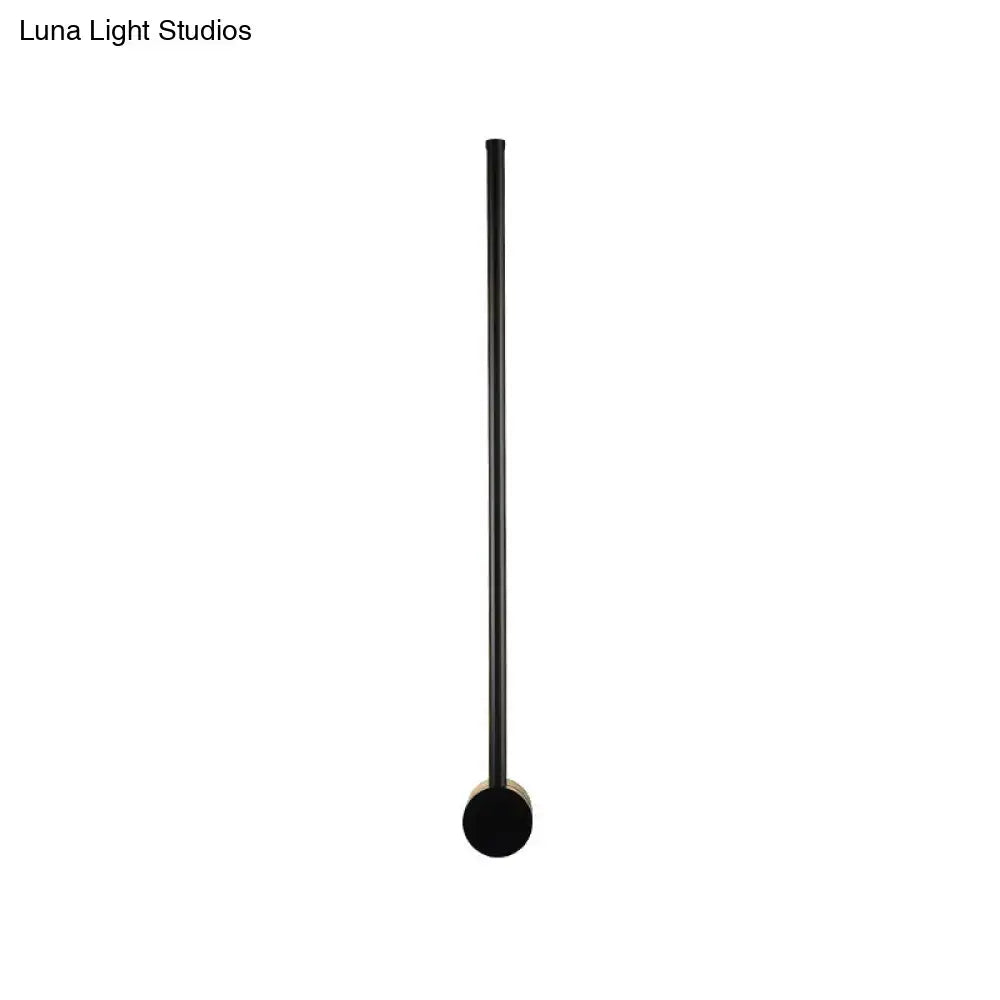 Black Needle Wall Light by Decorbites; slender black metal rod with round wall mount on Tampa Home & Garden Store