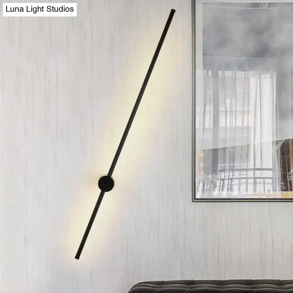 Black needle wall light, diagonal black metal rod with central knob on Tampa Home & Garden Store
