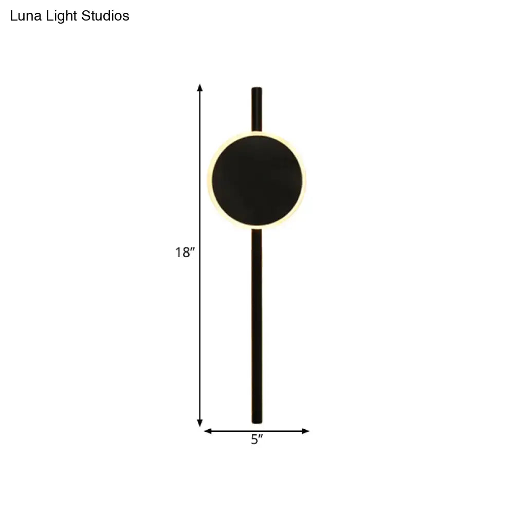 Black LED flush wall sconce by Decorbites circular backplate vertical stem and warm halo on Tampa Home & Garden Store