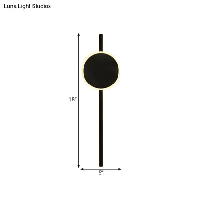 Black LED flush wall sconce by Decorbites circular backplate vertical stem and warm halo on Tampa Home & Garden Store