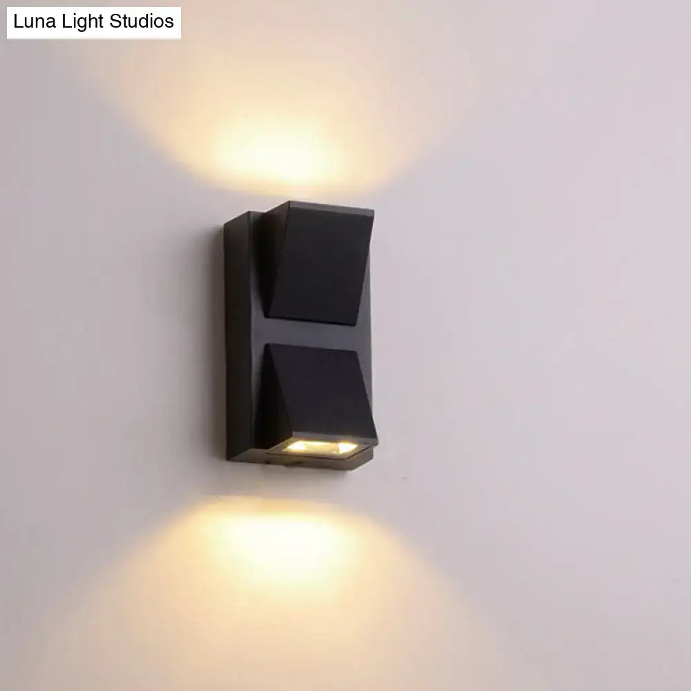 Black Triangle Wall Lamp by Decorbites, black metal wall sconce with warm up/down lighting on Tampa Home & Garden Store