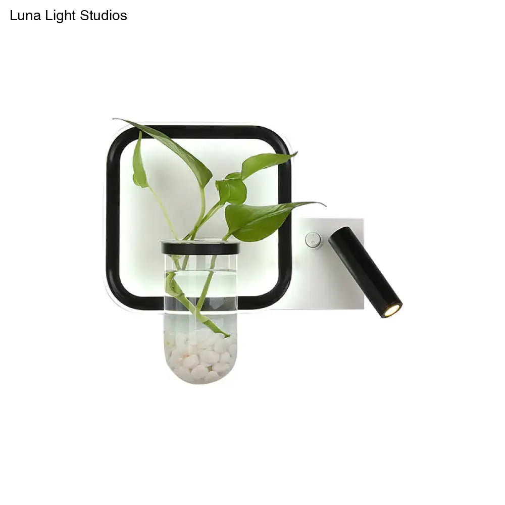 Glass Plant Sconce Light by Decorbites; black frame with glass vase planter and plant on Tampa Home & Garden Store