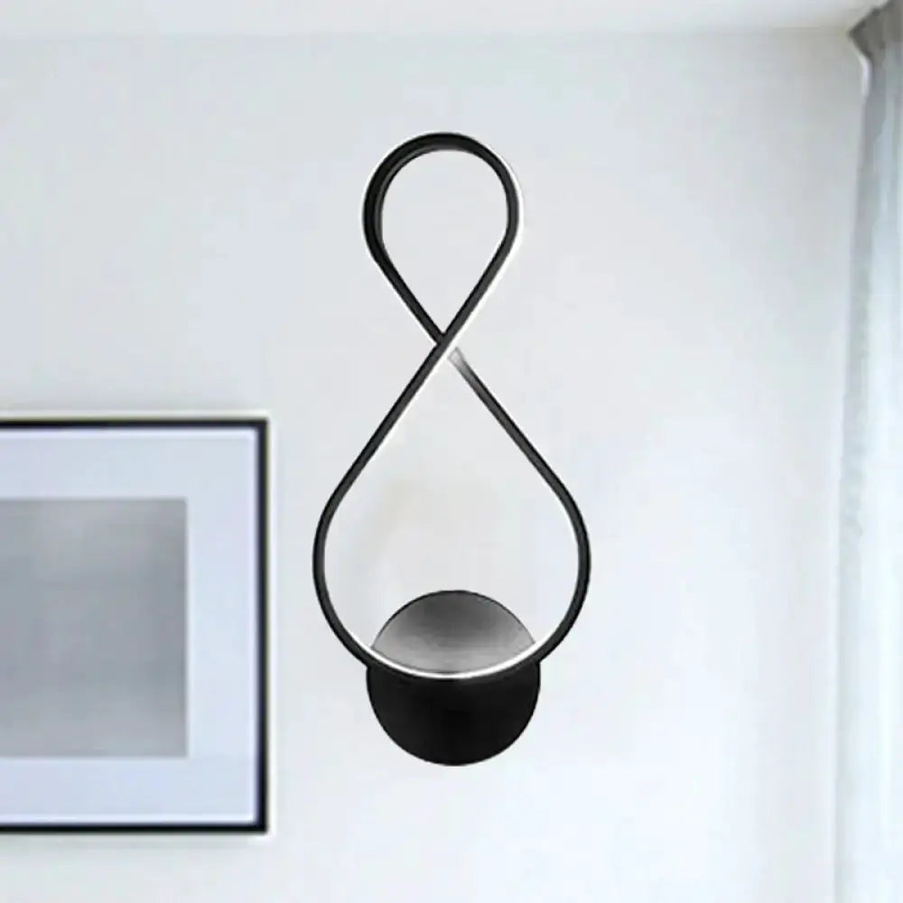 Minimalist black & white acrylic LED wall lamp sconce by Decorbites with looping frame on Tampa Home & Garden Store