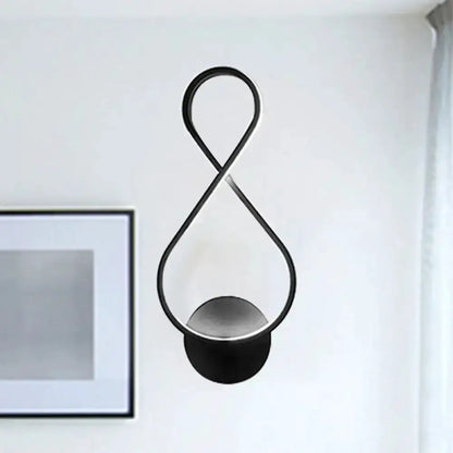 Minimalist black & white acrylic LED wall lamp sconce by Decorbites with looping frame on Tampa Home & Garden Store