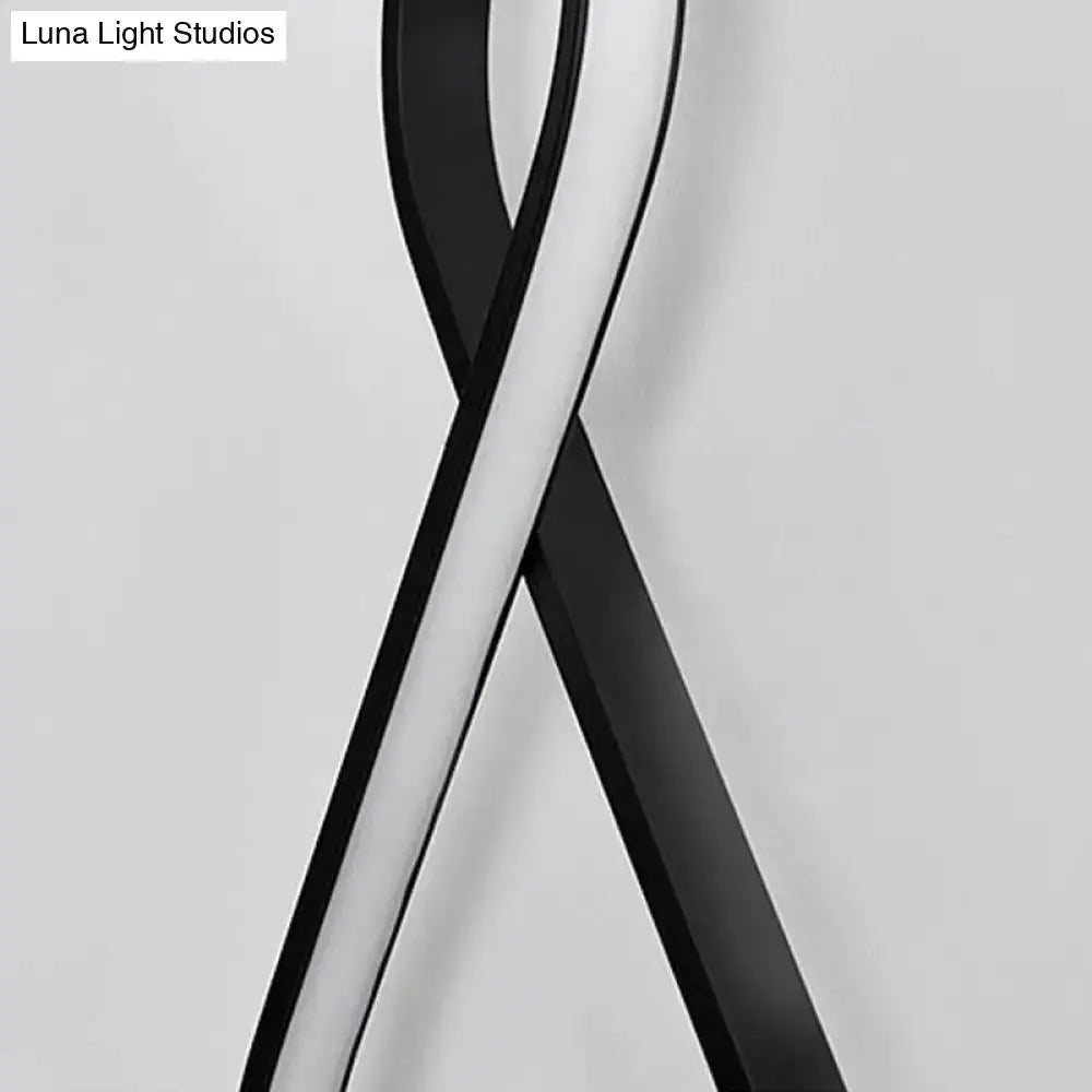 Minimalist black and white acrylic LED wall lamp sconce with twisting loops Decorbites on Tampa Home & Garden Store