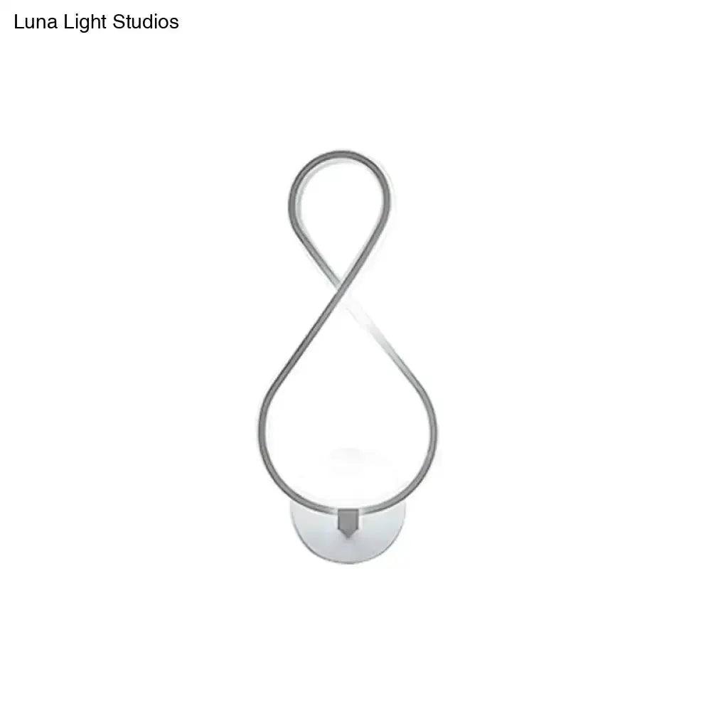 Decorbites minimalist black & white acrylic LED wall sconce with looped teardrop on Tampa Home & Garden Store